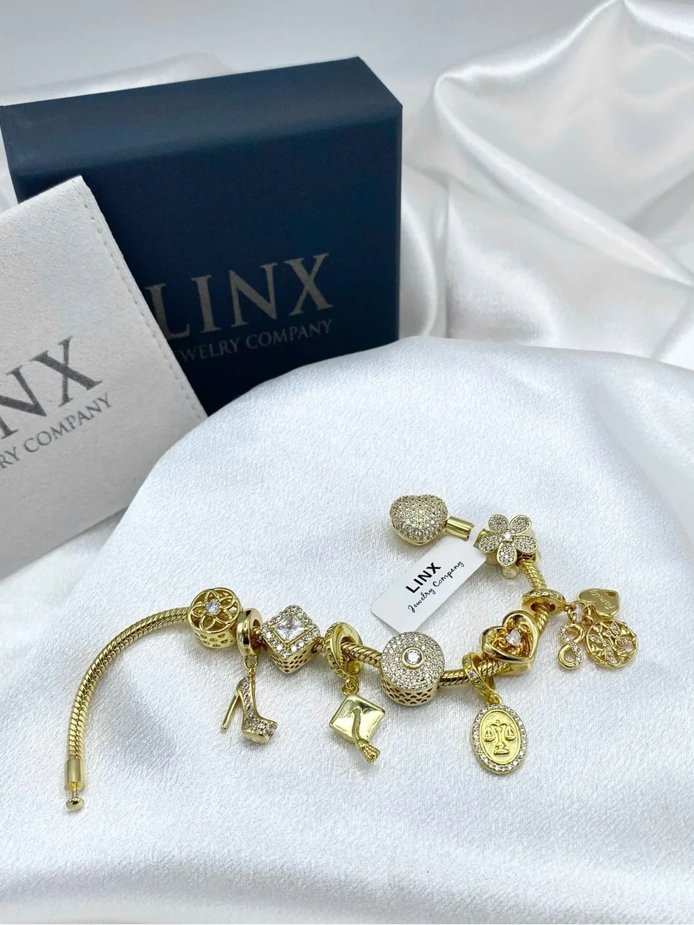 Linx Yellow Gold Snake Chain Charm Bracelet with Lawyer Themed Charms